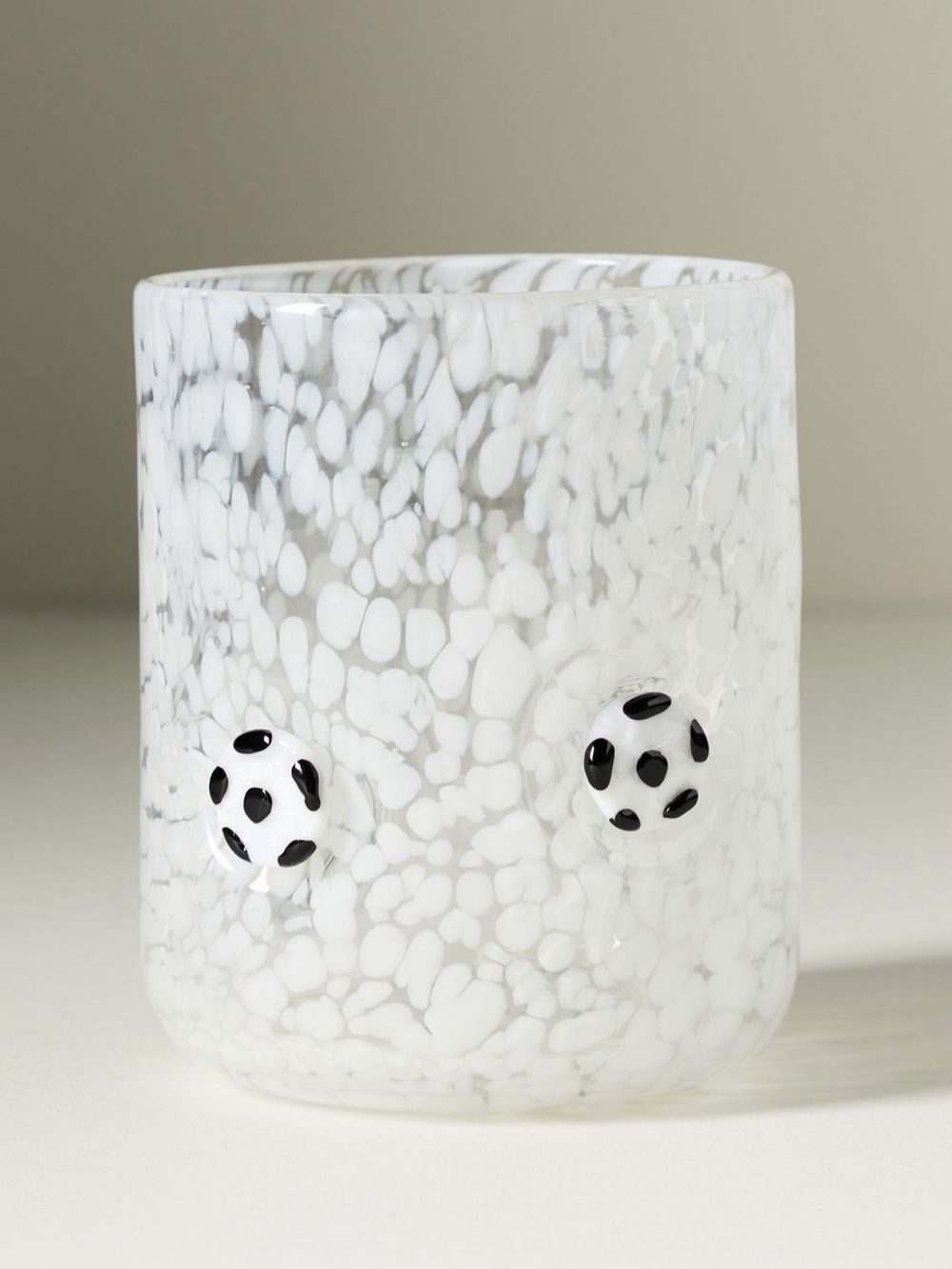 White Speckled Glass with Soccer balls. Mouth blown.